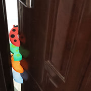 Cartoon-shaped child safety door guard